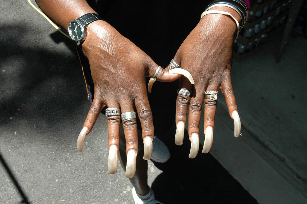 RUOKEXIN applied on model hand in lifestyle setting showing elegant long square nails