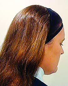 RWR No Knot worn under riding helmet showing smooth low-profile fit