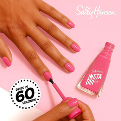 Sally Hansen Confetti Pop on manicured nails in lifestyle scene for instant sparkle