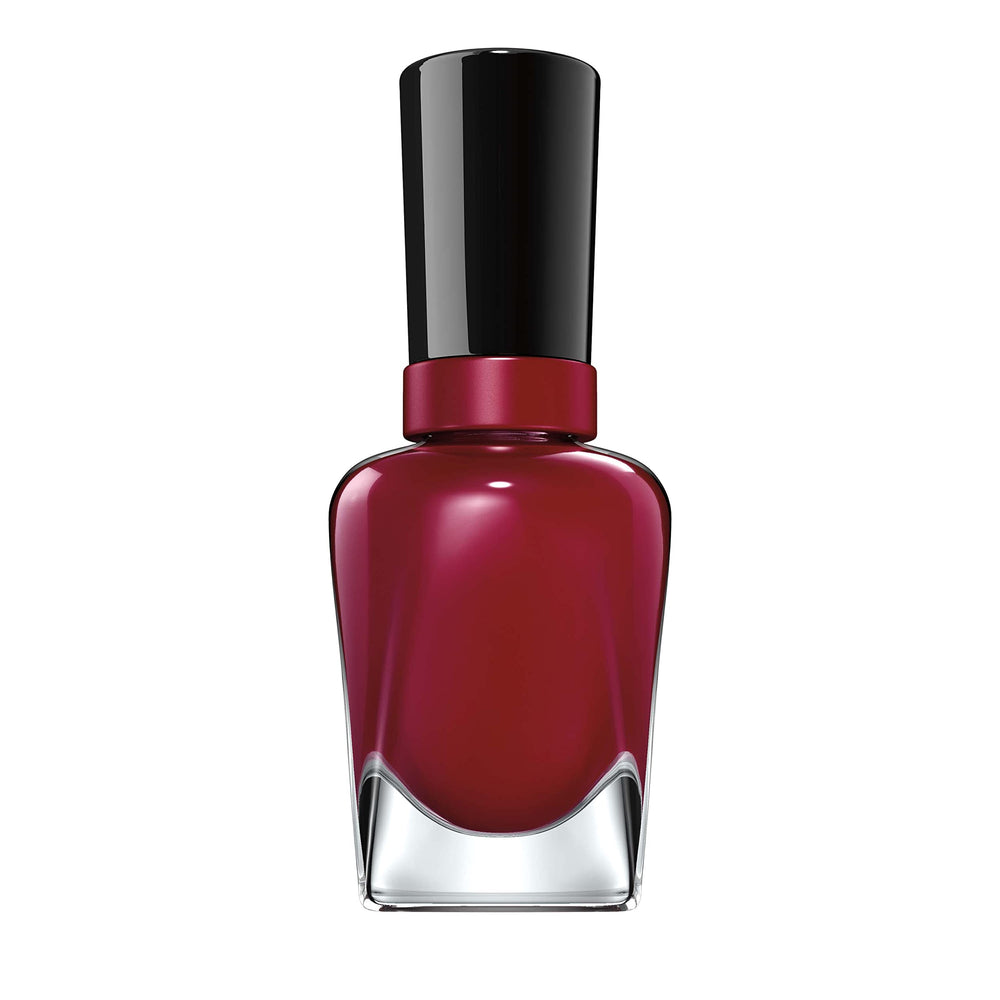 Sally Hansen bottle on a dressing table lifestyle shot conveying at-home salon results