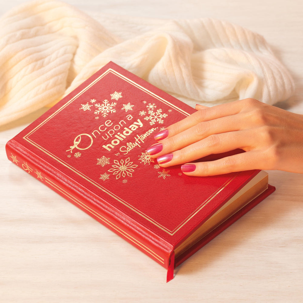 Sally Hansen Holiday Romance color bottle paired with Miracle Gel Top Coat for lasting shine
