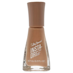 Sally Hansen bottle front view showing nude shade and compact size for travel