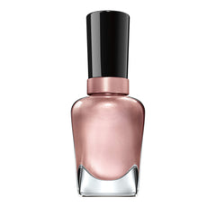 Sally Hansen bottle beside coin size comparison showing compact travel-friendly benefit