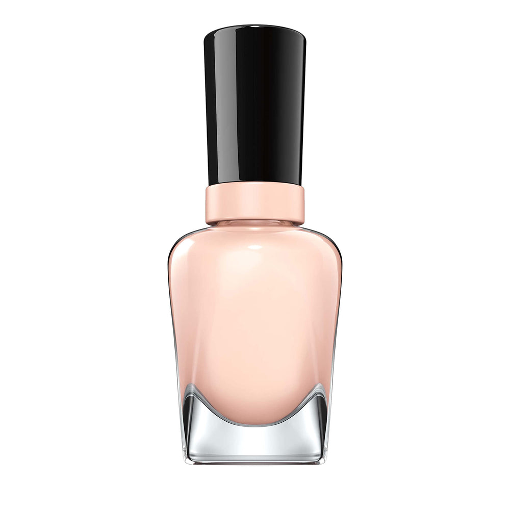 Sally Hansen on desk with manicure tools showing easy at-home use