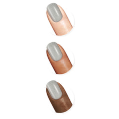 Sally Hansen swatch on finger showing bold silver color payoff