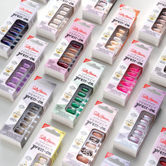 Layout showing Sally Hansen nail sizes beside a ruler to illustrate fit and scale for selection