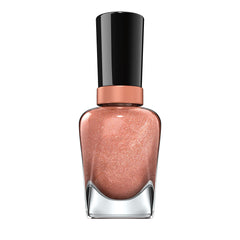 Sally Hansen Terra-Coppa manicure on tabletop lifestyle scene showing wearable color