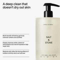 Hand lathering Salt & Stone body wash showing creamy foam and gentle cleansing benefit