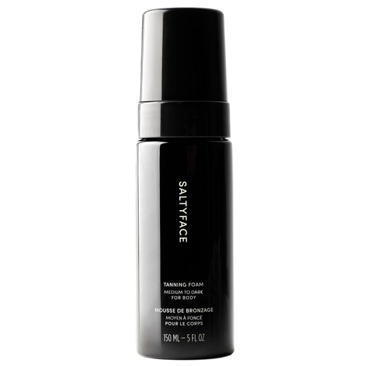 SALTYFACE compact pump bottle front showing clear foam and volume control benefit