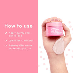 Sand & Sky jar in a bathroom spa setting, evokes relaxing self-care routine benefit