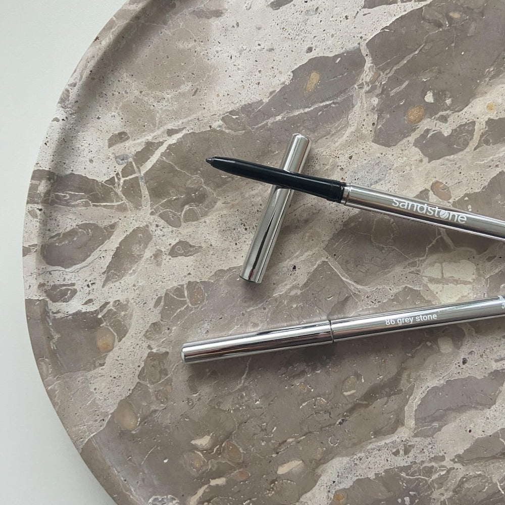 Sandstone Scandinavia eyeliner applied to eyes demonstrating defined metallic finish