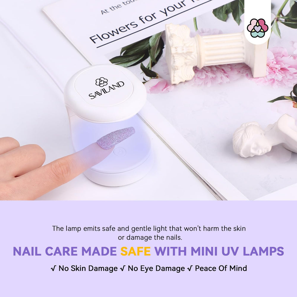 Saviland mini lamp held in hand showing small size and portability