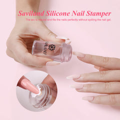 Saviland stamper in use transferring a white crescent for repeatable salon-style tips