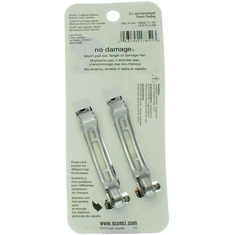 Scunci barrette clipped as a side accent demonstrating discreet styling and all-day hold