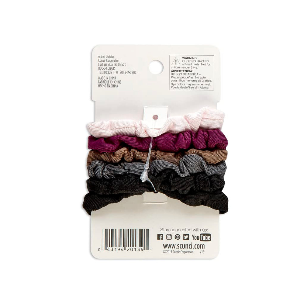 Scunci fabric texture close-up illustrating soft cushion and gentle hair care