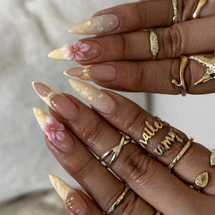 SEENEEY close-up of pink floral accent nail revealing fine artwork and feminine appeal