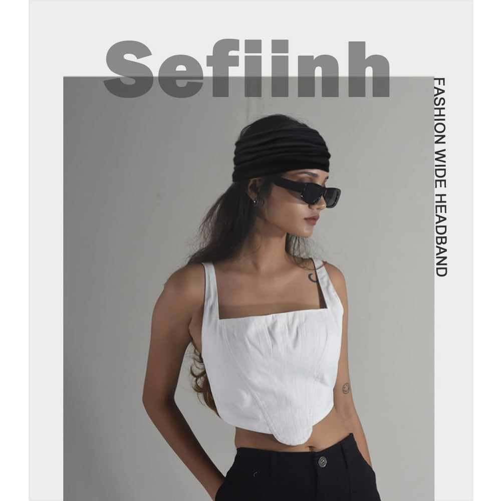 Sefiinh headband held in hand indicating size and one-size-fits-most fit