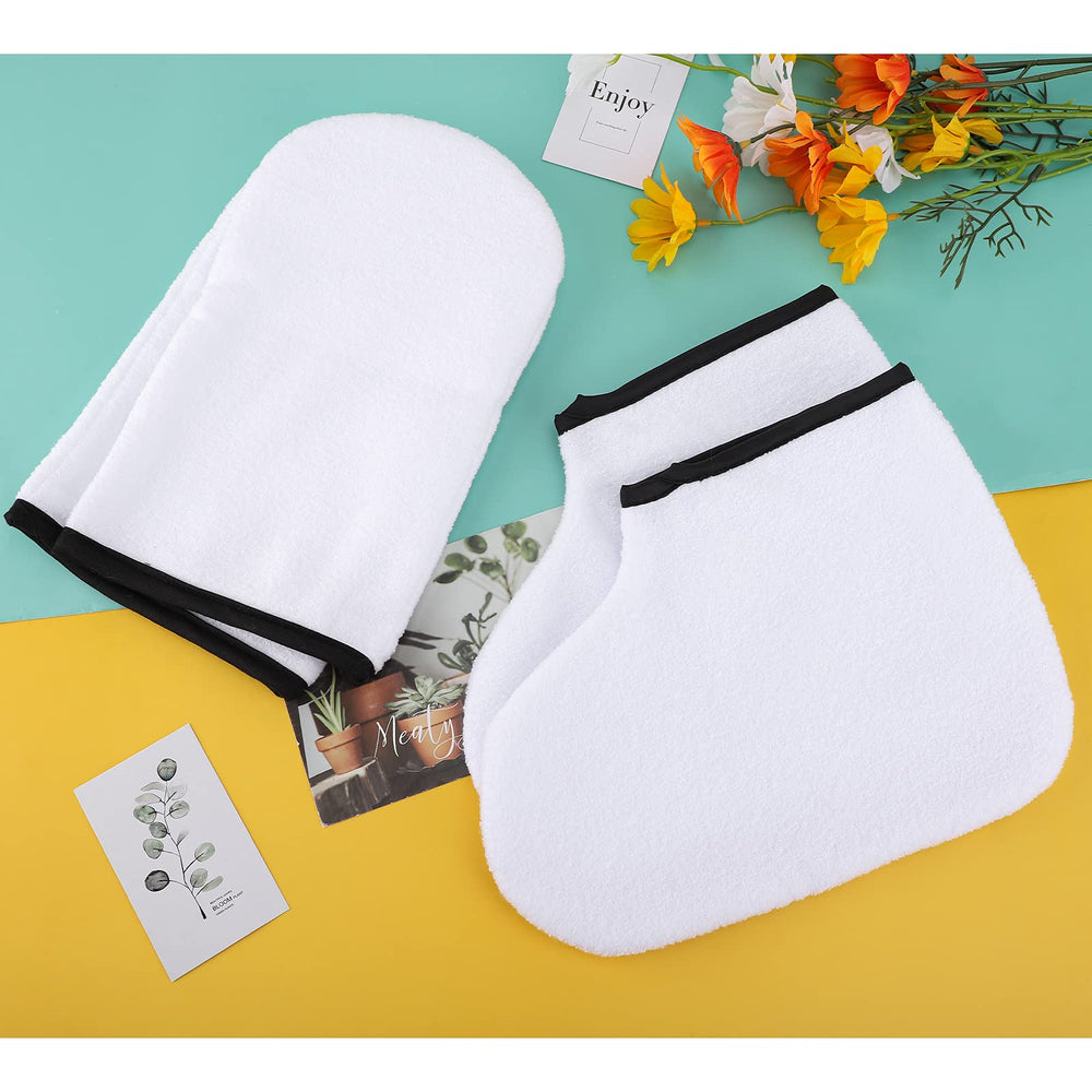 Segbeauty packaged mitts and booties beside paraffin warmer setup