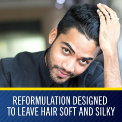 Visual emphasis on pyrithione zinc ingredient in Selsun Blue for dandruff control