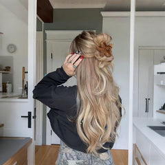SEMATA clip used in half-up hairstyle showing quick styling benefit and polished look
