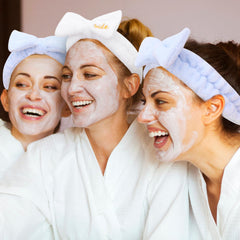 Semato headband worn during facial routine keeping hair back for clear skin care