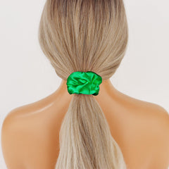 Semato sixteen green scrunchies lined up showing uniform color and quantity benefit team matching