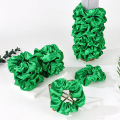 Semato single green scrunchie flat lay showing full shape and elastic quality benefit durable use
