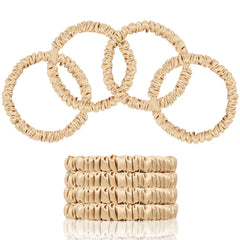SEMRUE front view of four champagne gold silk scrunchies showing neat packaging and luxury appeal