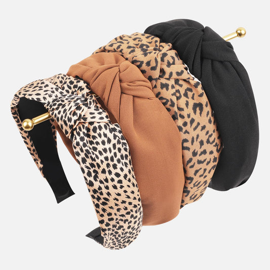Sept Montagne pack view showing four knotted headbands, versatile styling benefit