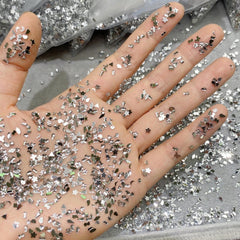 Sevgob rhinestones applied in salon manicure, adding sparkle and design detail