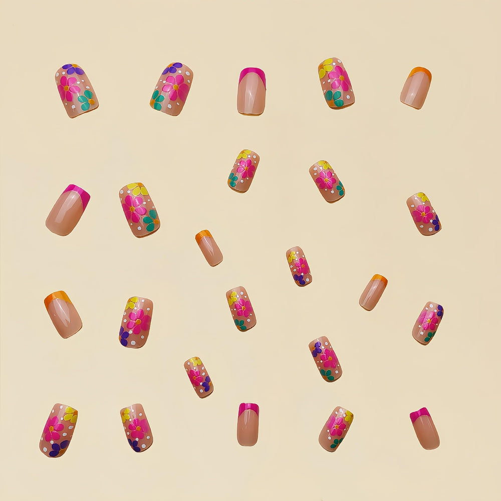 Sevgob side view of pink-orange French tips showing vibrant gradient