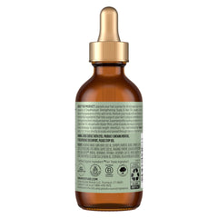 Shea Moisture dropper dispensing oil demonstrating precise application control