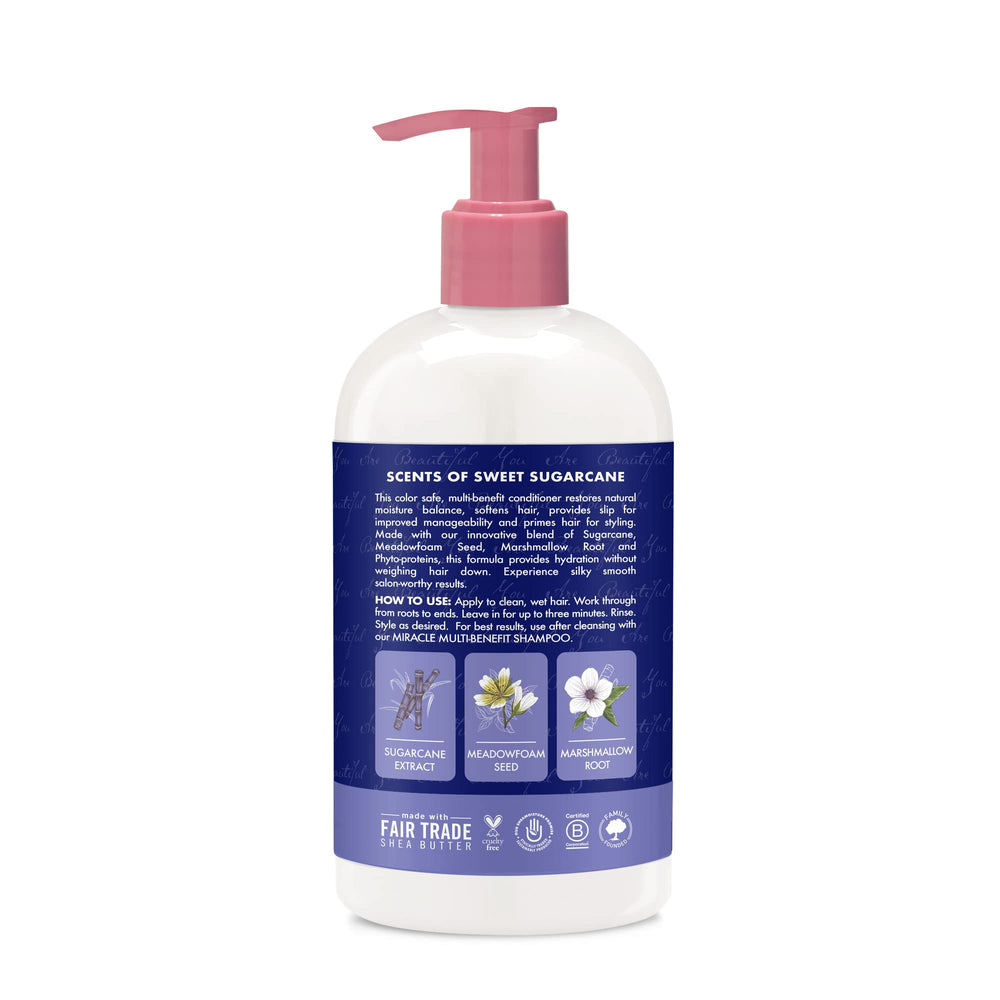 SheaMoisture sugarcane and meadowfoam ingredients arrangement, showcases natural conditioning