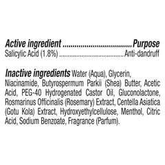 SheaMoisture lifestyle woman styling hair confidently after scalp soothing treatment