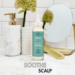 SheaMoisture scalp showing serum massaged in for immediate soothing relief