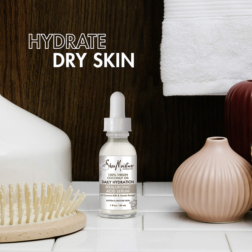 SheaMoisture serum texture close-up drop highlighting smooth, fast-absorbing formula benefit