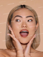 SHEGLAM powder applied with a brush for even, matte coverage