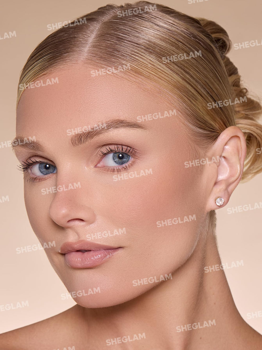 SHEGLAM bronzer blended on cheek for natural sculpting and warmth