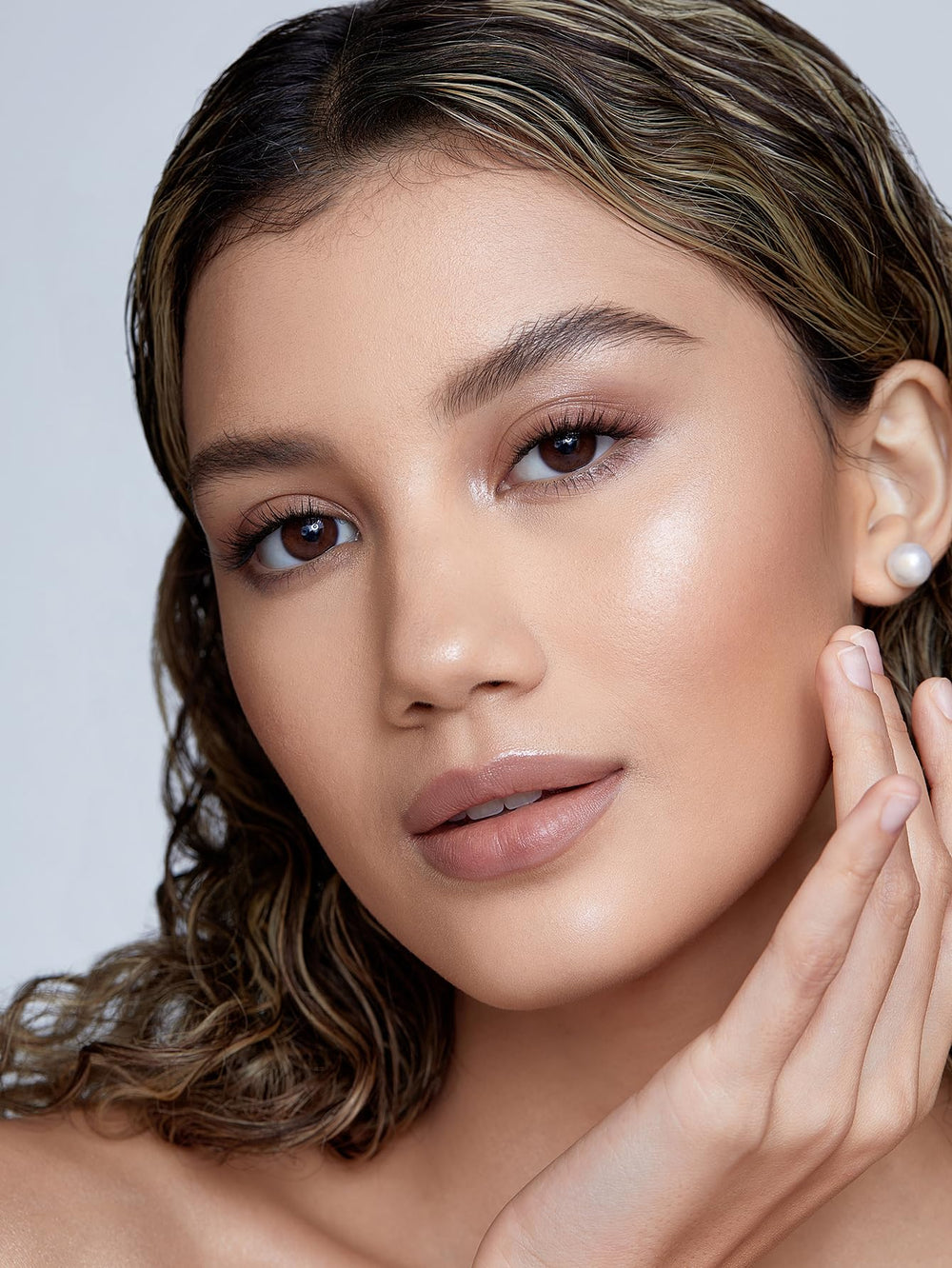 SHEGLAM open twist-up Vanilla Frost stick highlighting quick application