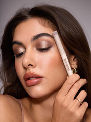 SHEGLAM applying stick on eyelid demonstrating easy application