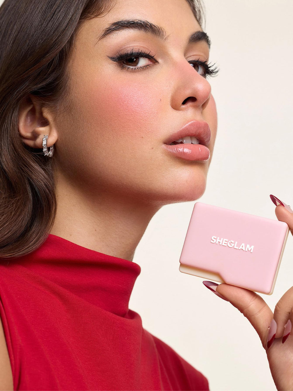 SHEGLAM model wearing Love Cake showing flattering cheek definition