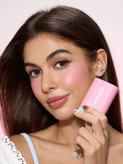 SHEGLAM stick inside a travel pouch illustrating portability and quick touch-ups