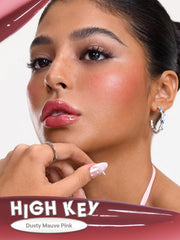 SHEGLAM lip swatch of High Key shade displaying reflective high-shine finish