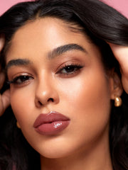 SHEGLAM swatch on skin showing color payoff and blendable texture