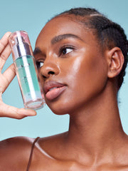SHEGLAM primer applied under foundation improving makeup adhesion benefit