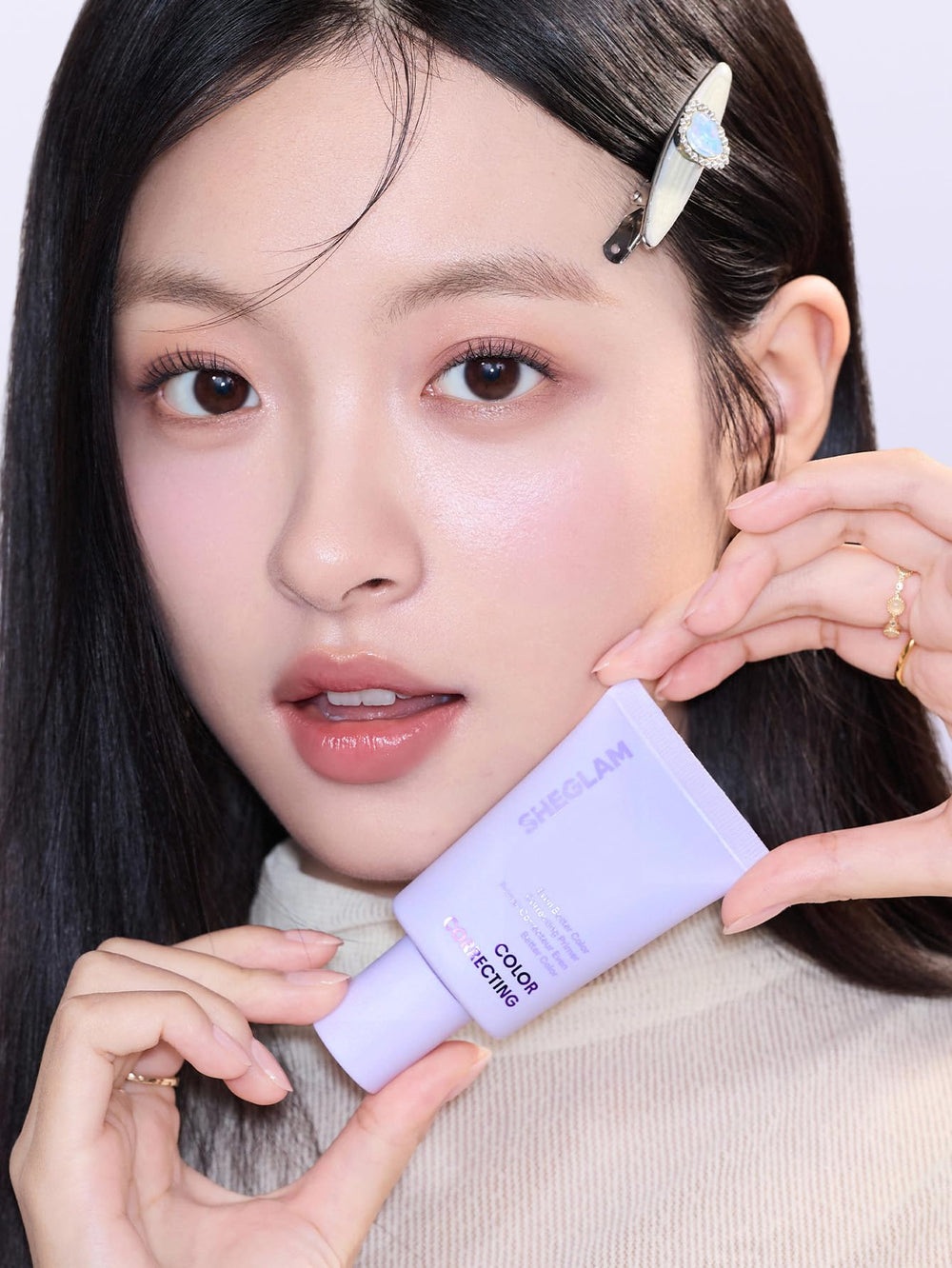 SHEGLAM primer on vanity with brush suggesting a polished routine and quick prep