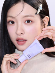 SHEGLAM primer on vanity with brush suggesting a polished routine and quick prep