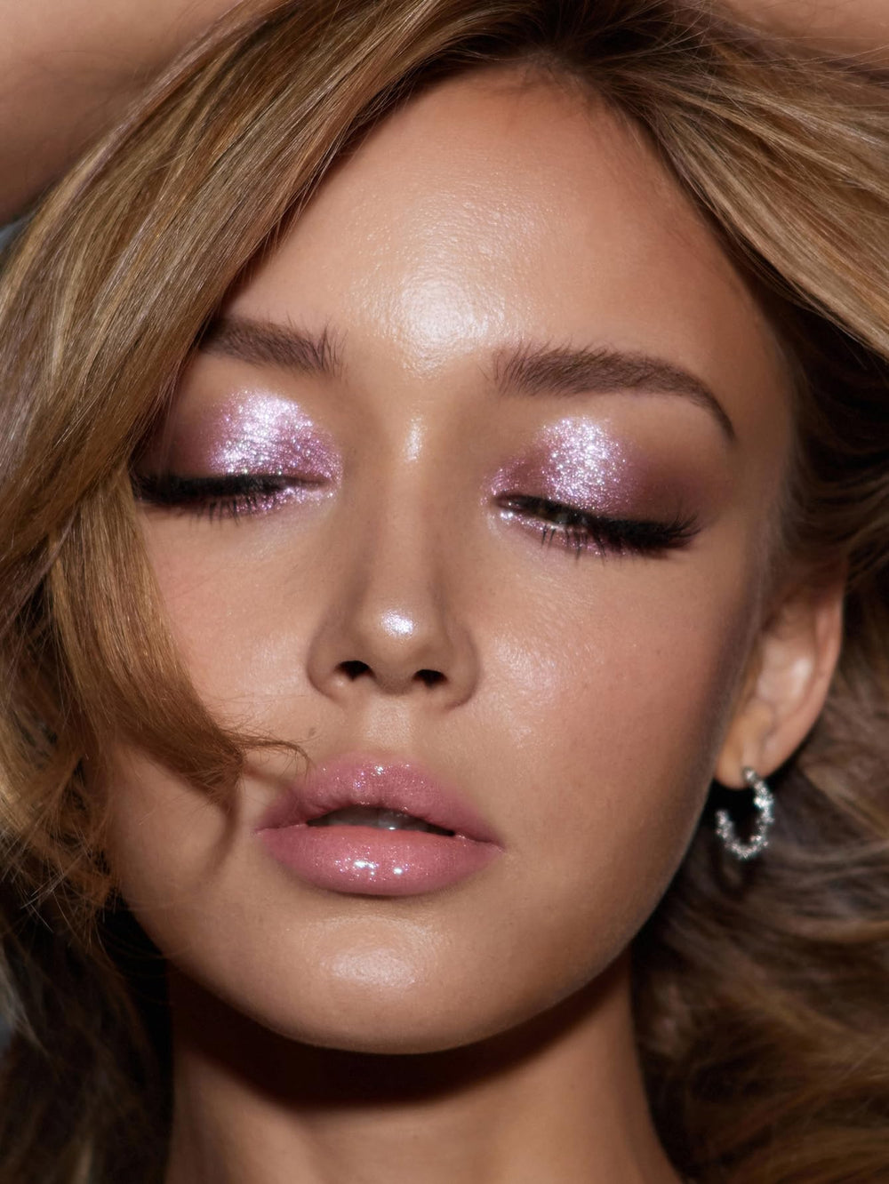 SHEGLAM Prismalight packaging in a vanity lifestyle shot communicating premium cruelty-free beauty