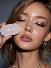 SHEGLAM compact in hand showing scale and travel-friendly convenience