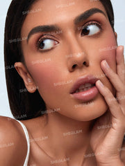 SHEGLAM swatch on arm with Dreamer shade showing buildable pigment